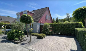 Vakantiehuis op Villapark Oesterbaai aan zee , met speeltuin grenzend aan de tuin